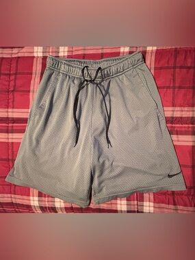 Nike Men's Light Gray Athletic Mesh Shorts with Black Drawstring